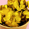 Tub filled with Zoi&co's sunny Golden Glow preserved hydrangea bits."
