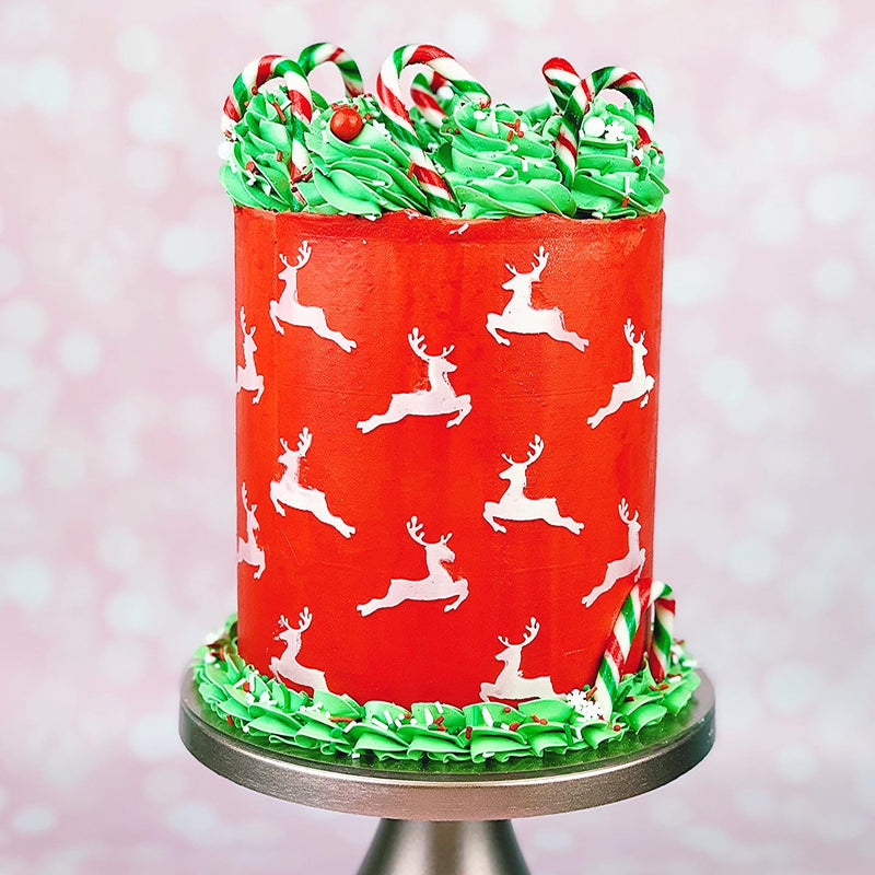 green & red christmas cake using the rudolph's family cake stencil zoiandco