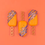 orange & purple cakesicles showing the square & chained mini cakesicle sticks zoiandco