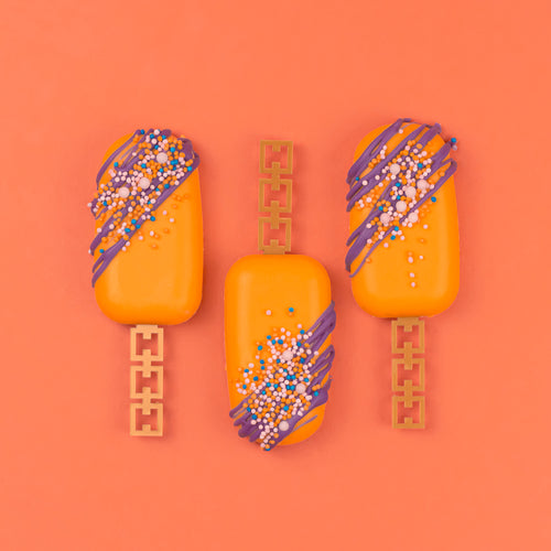 orange & purple cakesicles showing the square & chained mini cakesicle sticks zoiandco