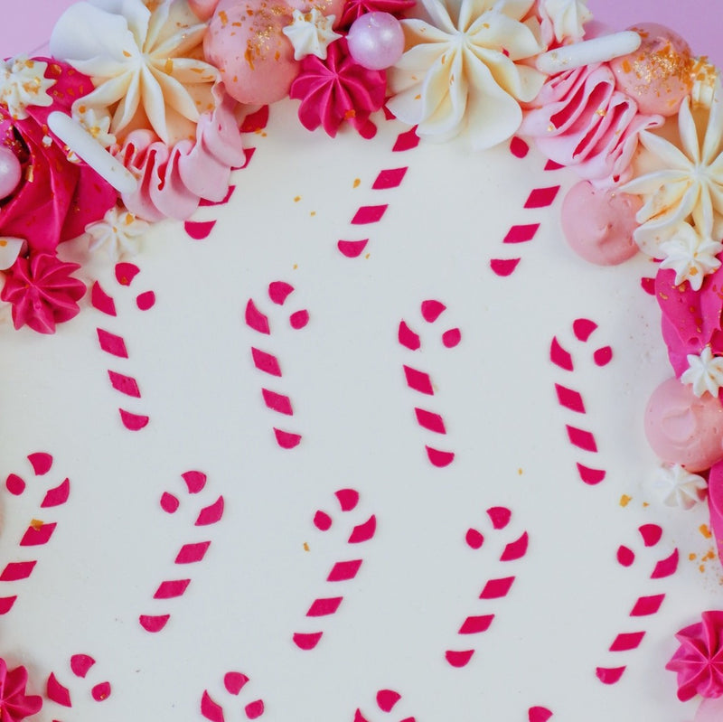 christmas cake with pink candy canes close up cake stencil zoiandco