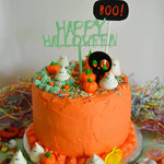 orange cake showing the happy halloween cake topper zoiandco