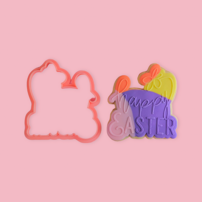 Happy Easter - Easter Cookie and Cutter on pink background