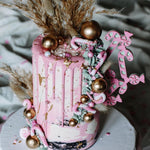 pink cake with pastel pink & green candy cane side cake topper - zoi&co