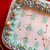 rectangular cake with mint christmas emojis close up cake stencil zoiandco