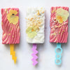 white & rose cakesicles showing the bubbly standard cakesicle stick zoiandco